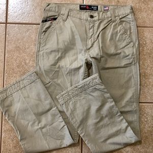 Men's ARIAT Workhorse FR Low Rise M4 Boot Cut Pants Khaki/Tan FR Size 34/34